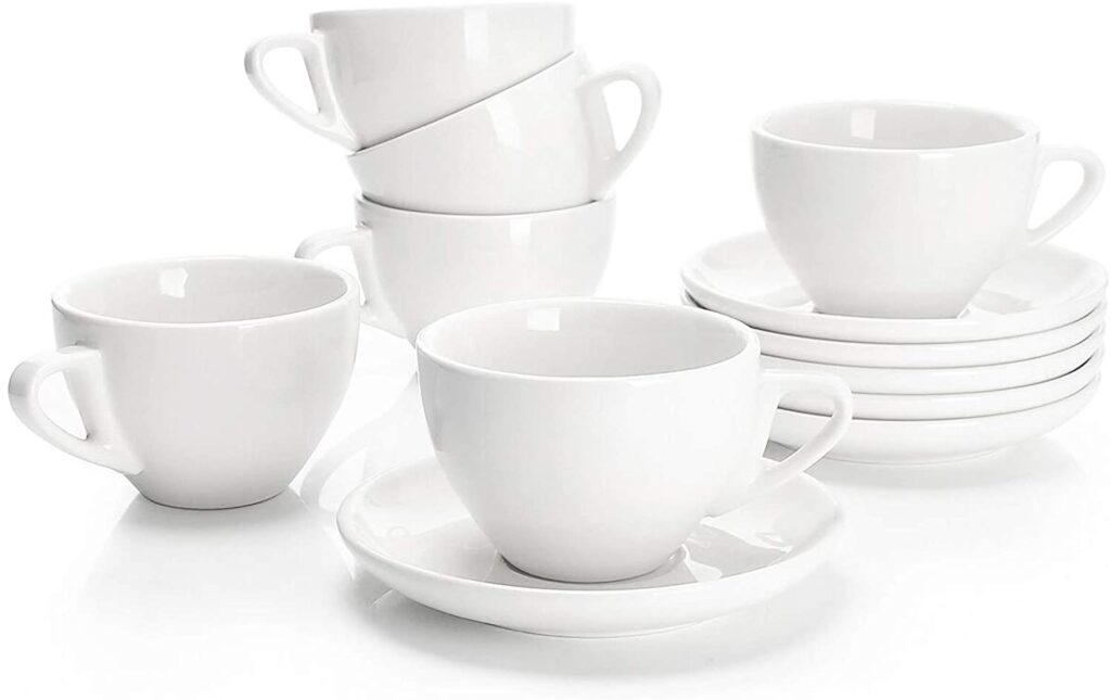 Sweese porcelain cappuccino cups with saucers.